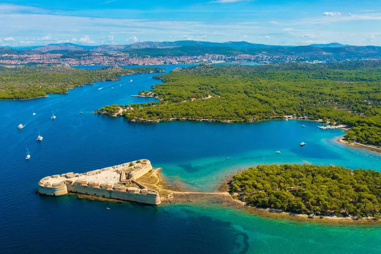 Sailing through St. Anthony Channel toward Šibenik on a luxury Croatian yacht charter