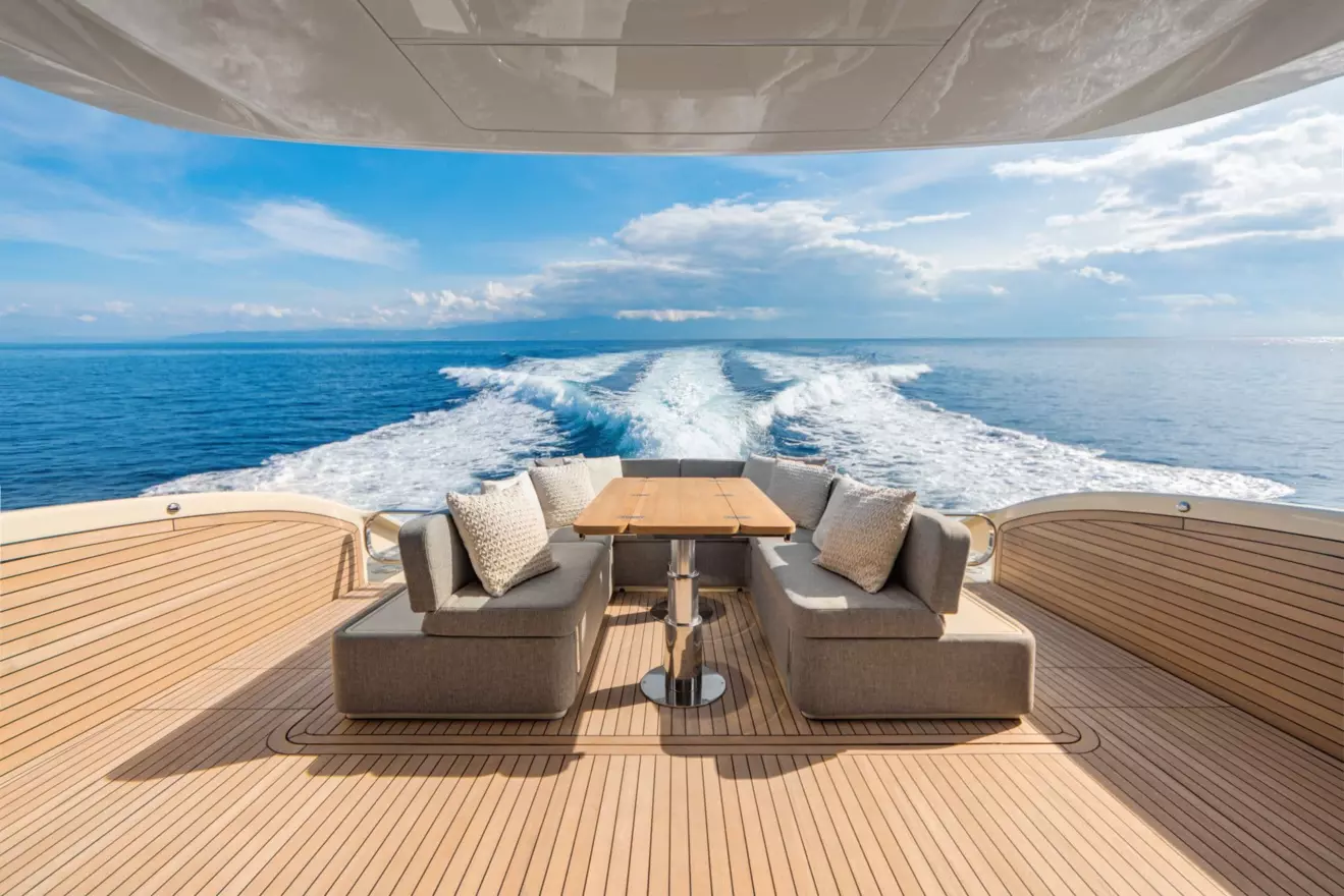 Invictus ST550 aft deck, swim platform, tender garage, easy boarding.