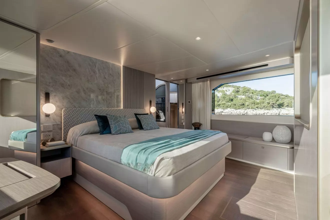 Luxurious master cabin on the Absolute 70 Fly with a central double bed