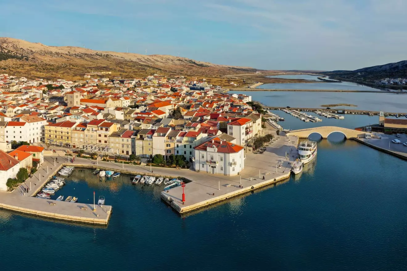A wide panoramic view of Pag Town.