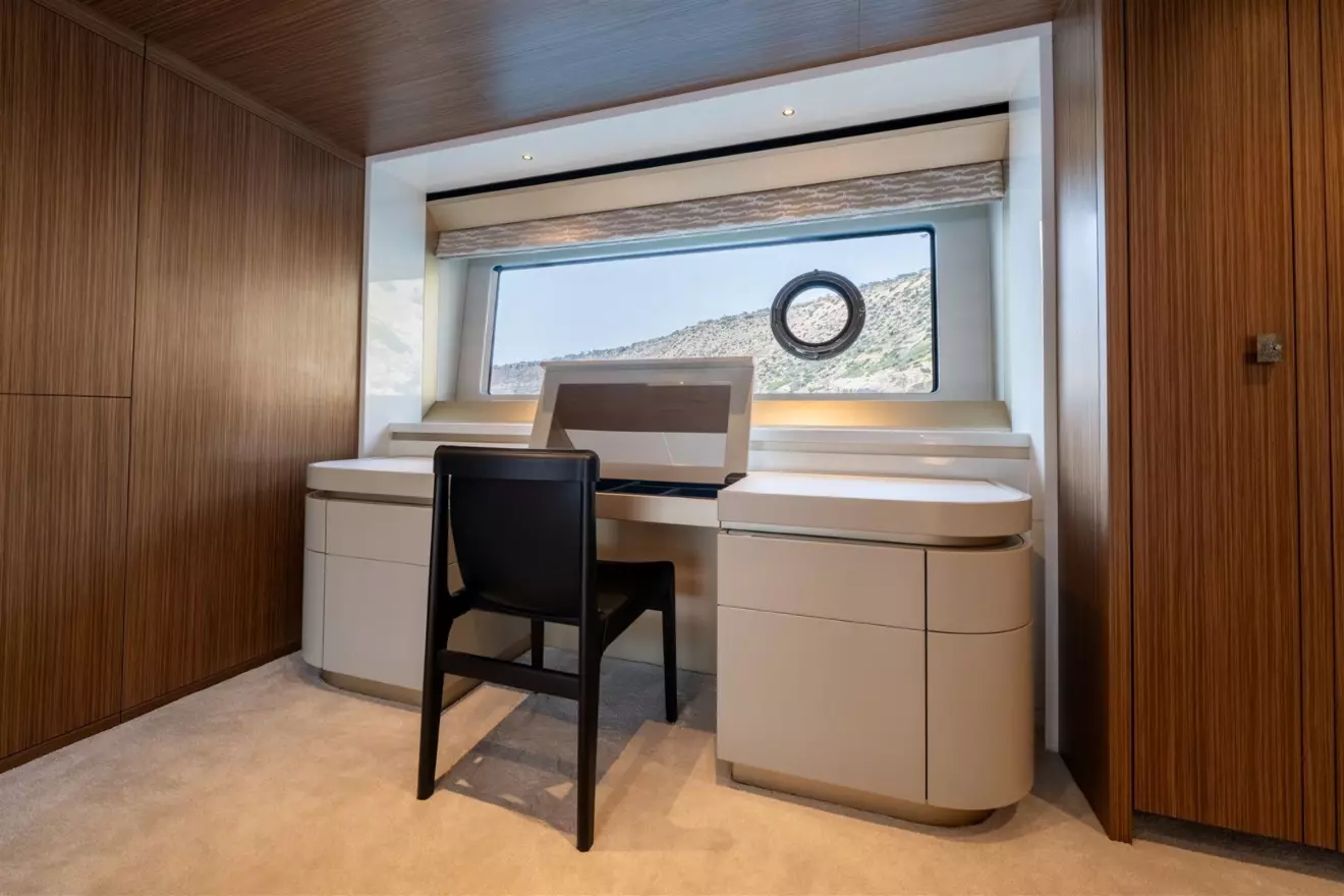 Dedicated office desk inside the full-beam master stateroom of Sunseeker Ocean 82