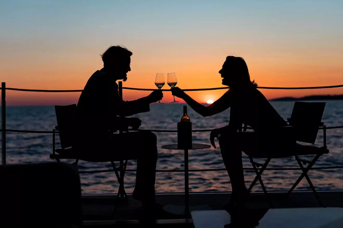 luxury yacht-drinking wine sunset.jpg