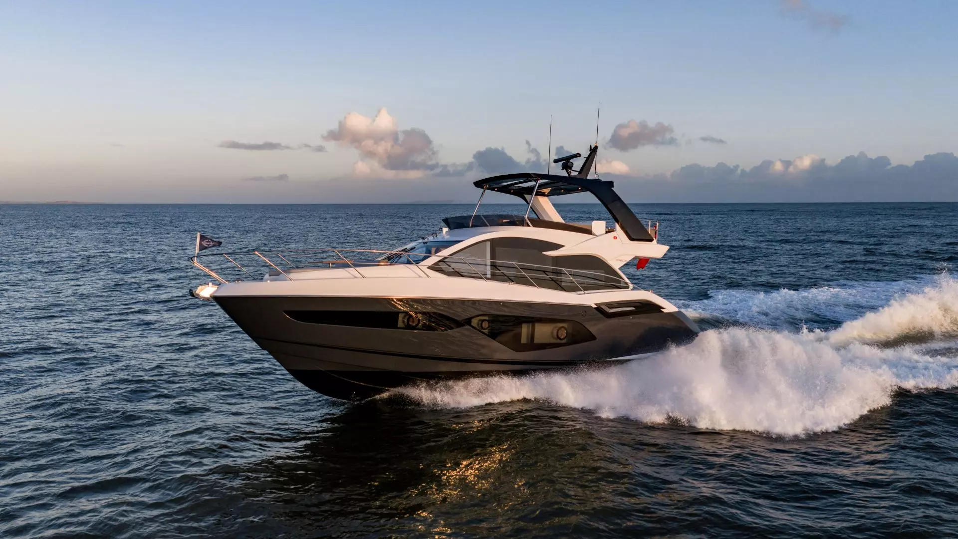 Sunseeker Manhattan 56 side profile underway on open water