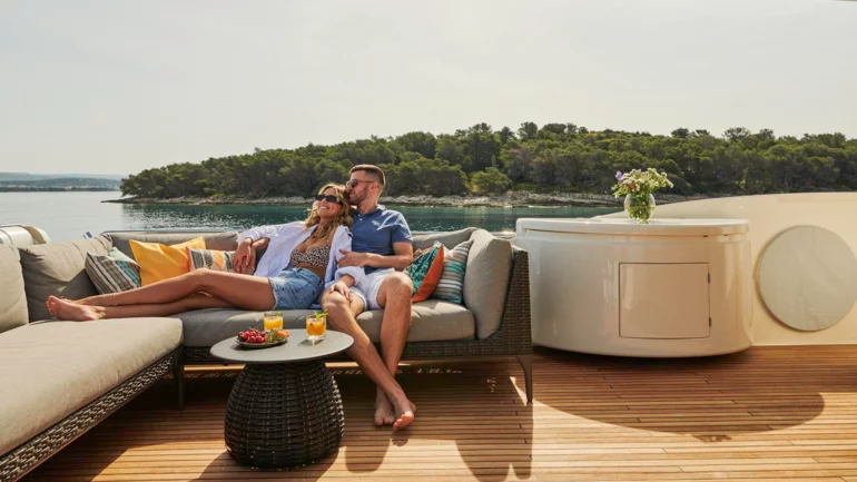 Guests lounging on boat sundeck