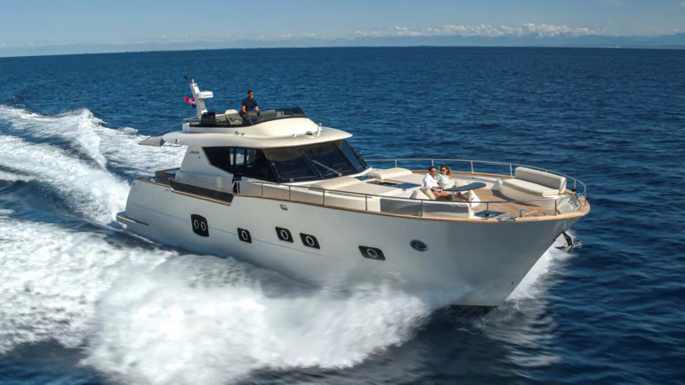 Luxury yacht running across the sea