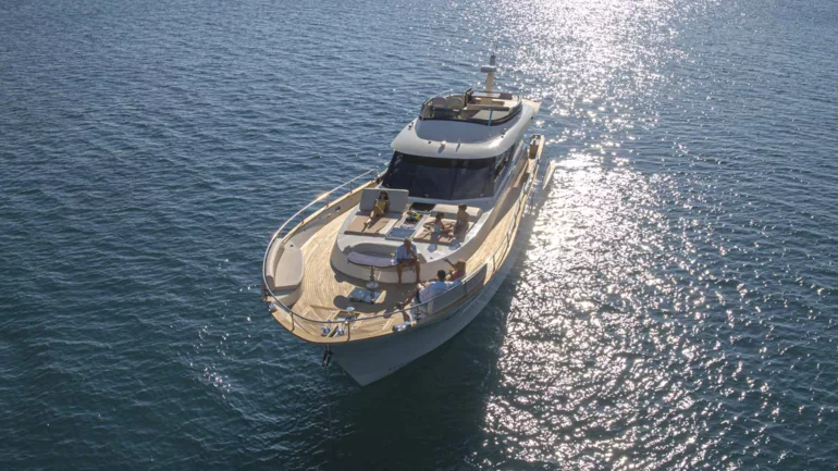 Guests sunbathing aboard a luxury yacht
