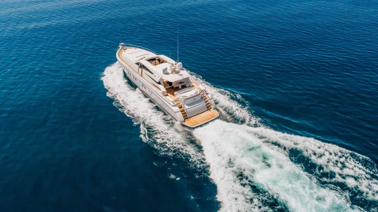 Luxury yacht running across the sea
